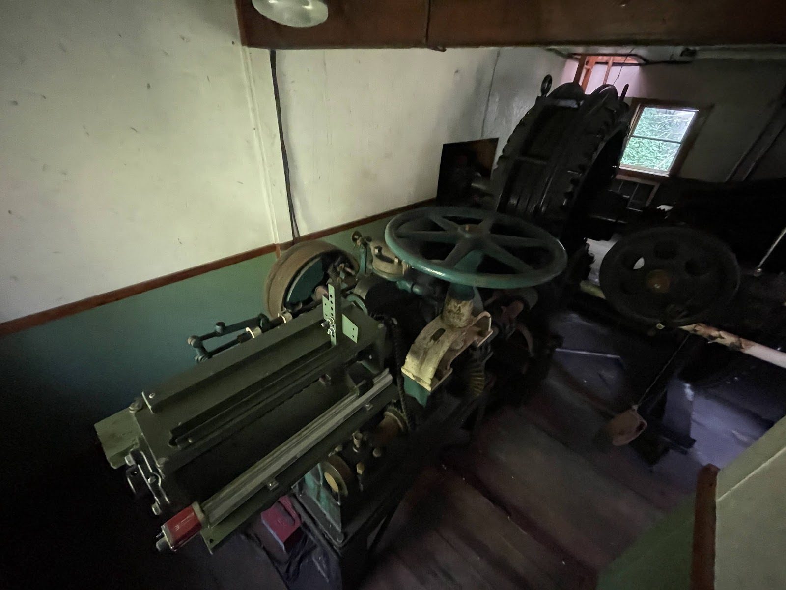 Inside the old powerhouse — machinery asleep for years.