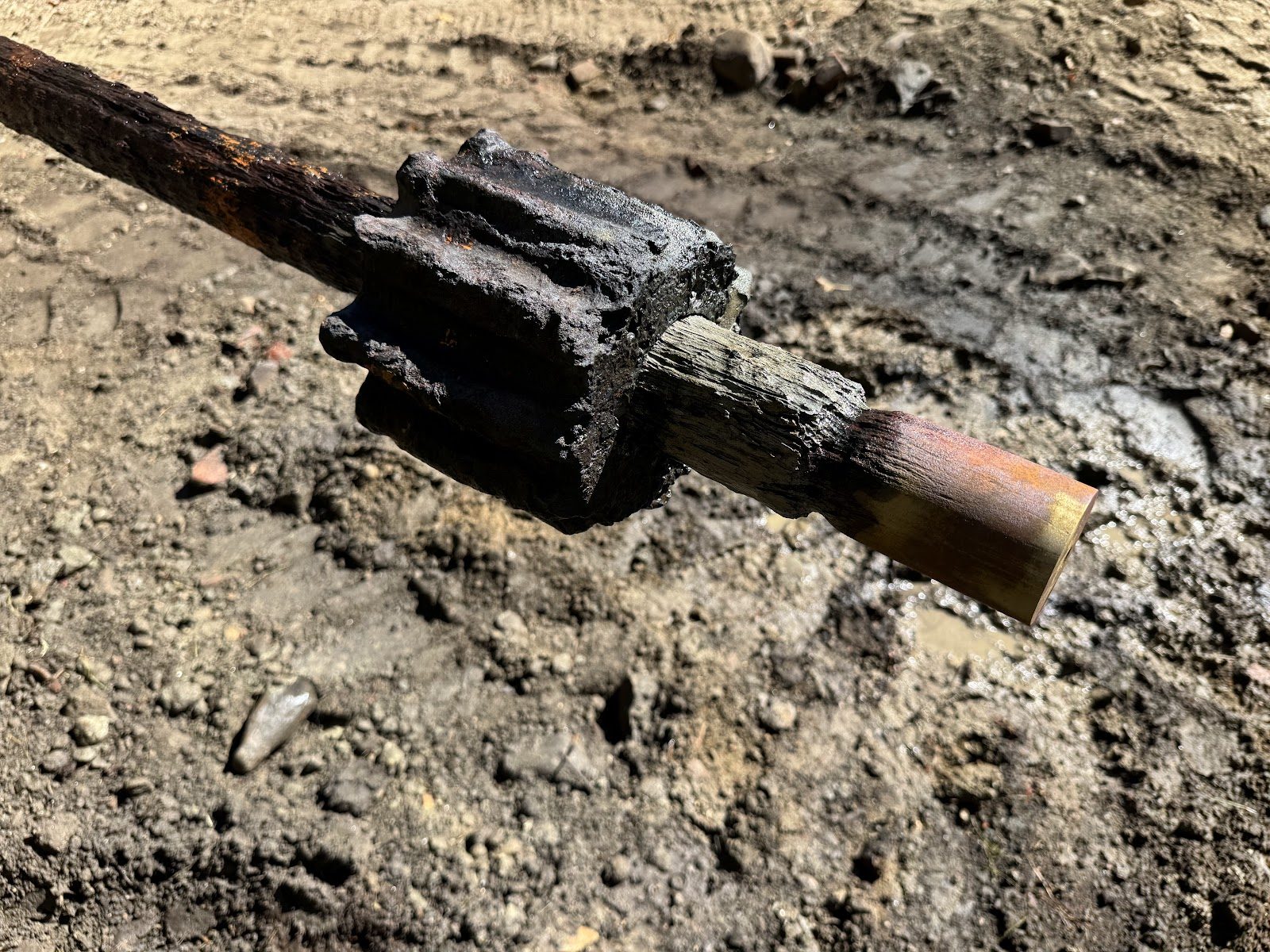 The original headgate pinion and shaft — slated for replacement.