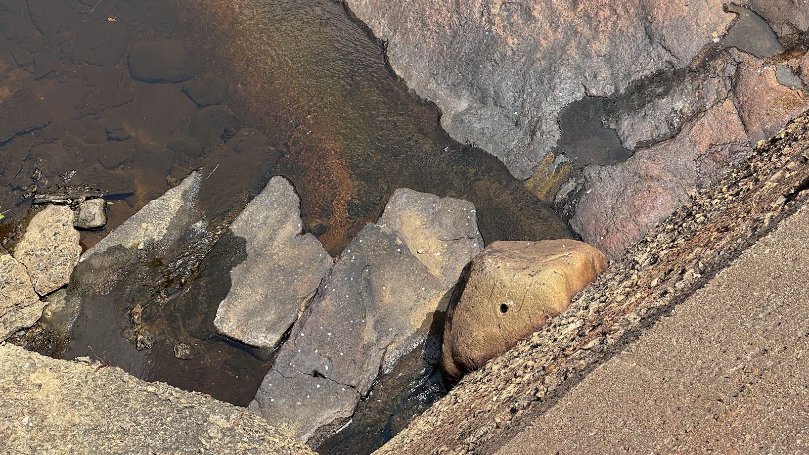 The dam's underwater face, revealed.