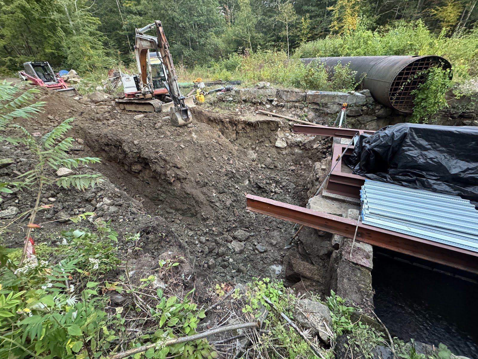 Steel and conduit going in around the headgate.