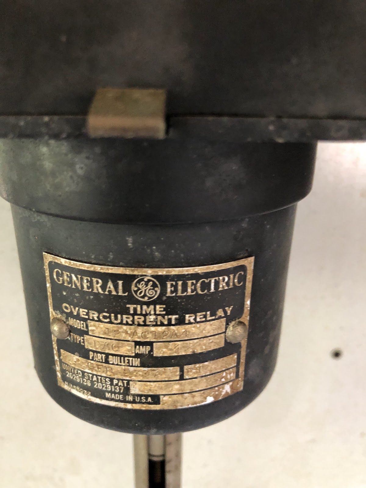A General Electric relay nameplate.