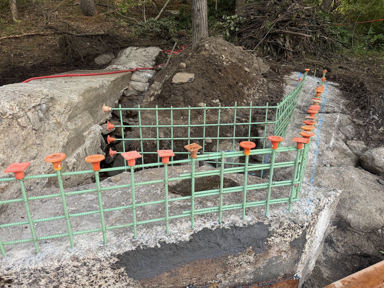 Epoxy-coated rebar tied and ready for concrete.