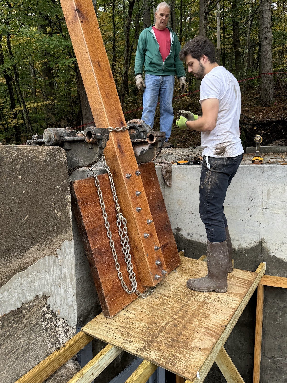 Placing and consolidating concrete in the forms.