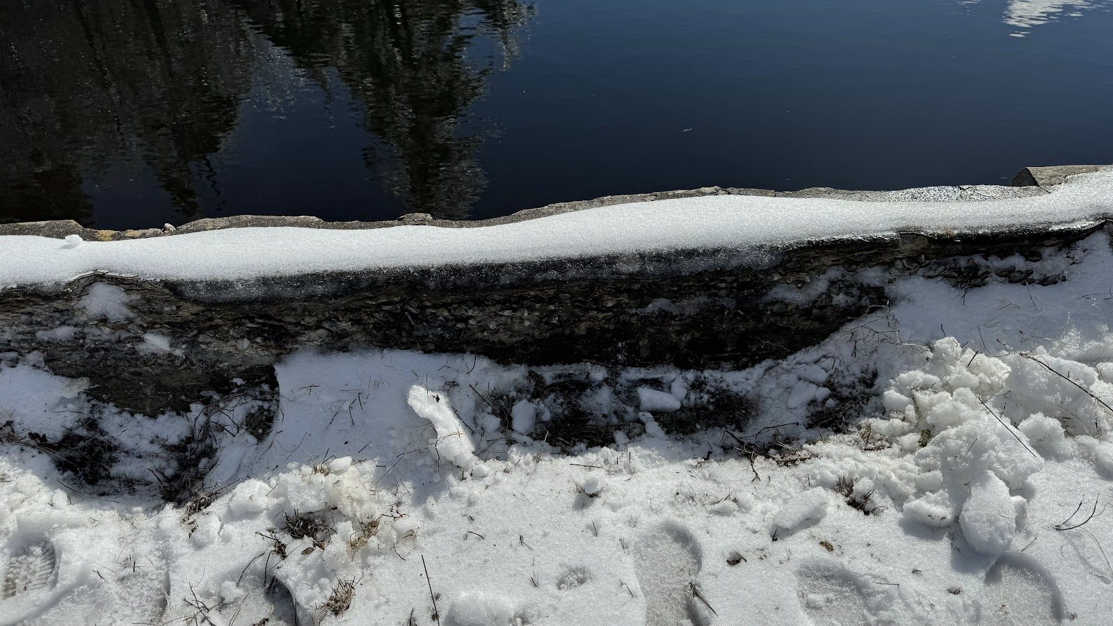 Snow on the dam crest.