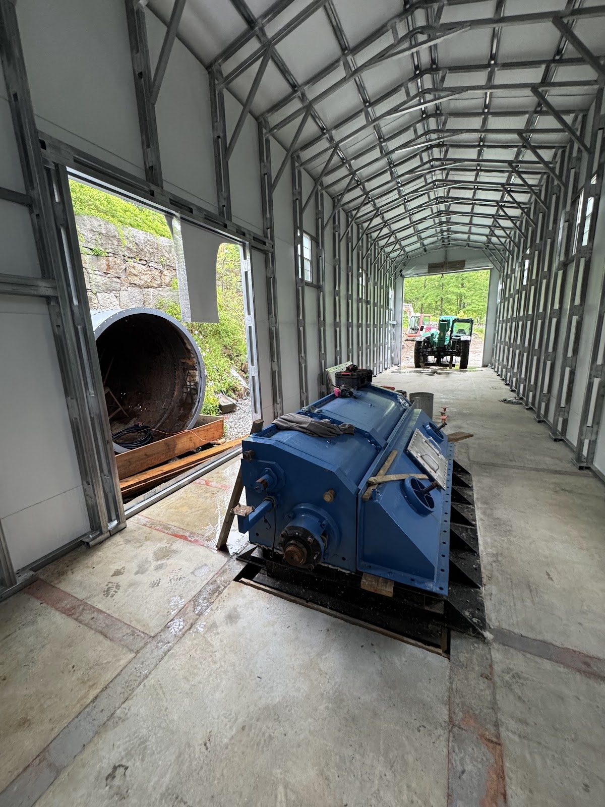 Inside the new shell: the penstock and drivetrain below.