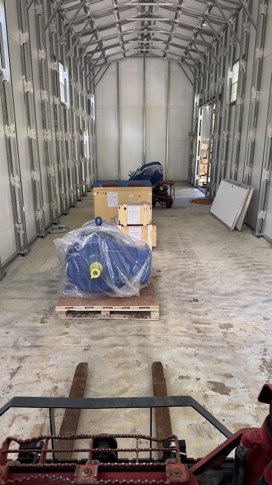 Deliveries staged inside the shell.