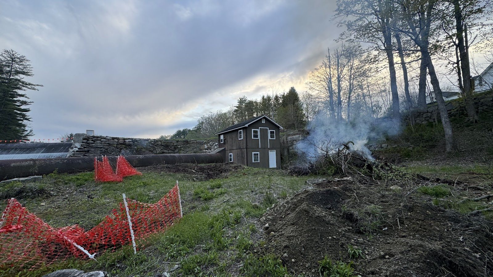 Brush burning at dusk.